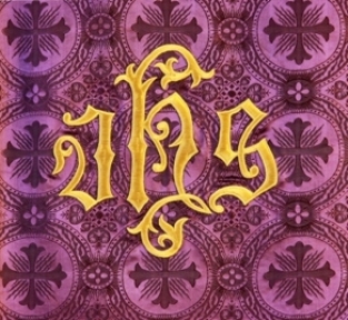 This photo of a pulpit banner bearing the IHS symbol, an early monogram of the Holy Name of Jesus - IHESUS, was taken by photographer Bill Davenport from Kentville, Canada. 